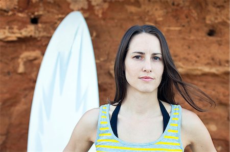 surfboard close up - Female surfer, portrait Stock Photo - Premium Royalty-Free, Code: 6115-08239315