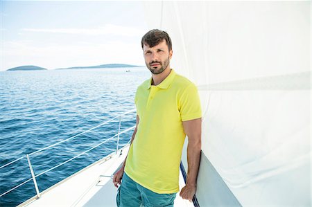 Portrait of man on sailboat, Adriatic Sea Stock Photo - Premium Royalty-Free, Code: 6115-08239767