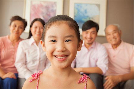 simsearch:6116-06939008,k - Multigenerational family smiling, portrait Stock Photo - Premium Royalty-Free, Code: 6116-06938671