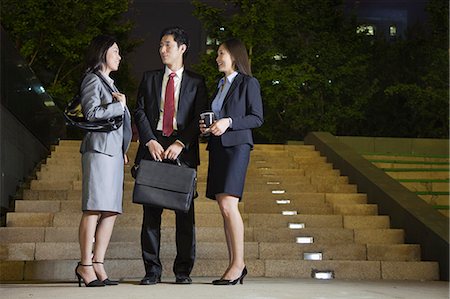 simsearch:6116-07084811,k - Three Business People Talking At Park Stock Photo - Premium Royalty-Free, Code: 6116-06938908
