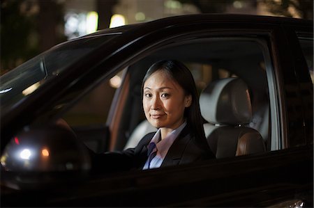 Mature Businesswoman Driving Car Foto de stock - Sin royalties Premium, Código: 6116-06938920