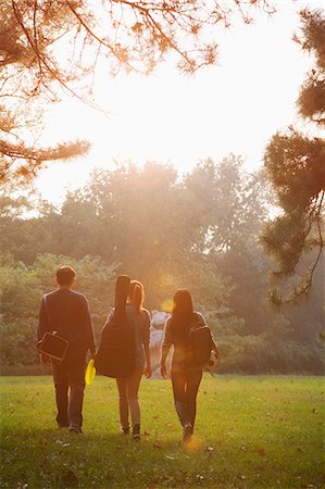 female playing soccer - Teenagers hanging out in the park Stock Photo - Premium Royalty-Free, Code: 6116-06939107