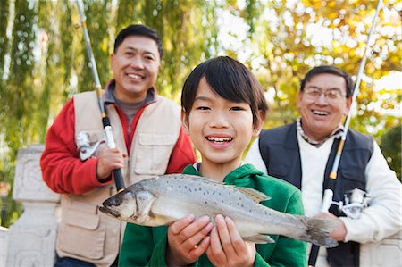 fishing - Multi-generational men fishing portrait Stock Photo - Premium Royalty-Free, Code: 6116-06939391