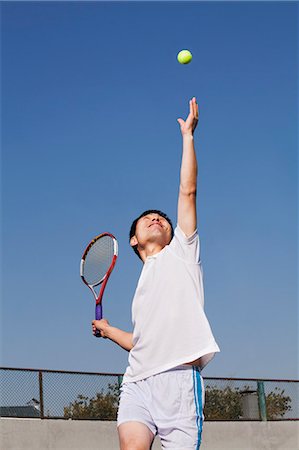 simsearch:640-06050635,k - Adult men serving the tennis ball Stock Photo - Premium Royalty-Free, Code: 6116-06939305