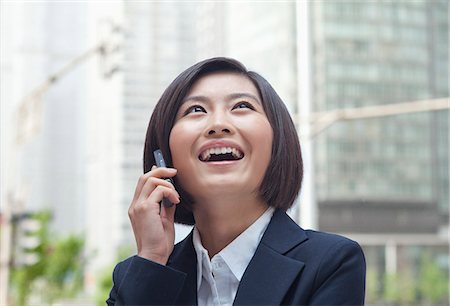 simsearch:6116-07084811,k - Young Businesswoman with Cell Phone Stock Photo - Premium Royalty-Free, Code: 6116-07084849
