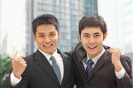 simsearch:6116-07084811,k - Portrait of Two Businessmen Cheering Stock Photo - Premium Royalty-Free, Code: 6116-07084802