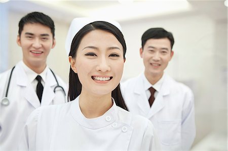 Portrait of Two Doctors and Nurse, China Stock Photo - Premium Royalty-Free, Code: 6116-07084915