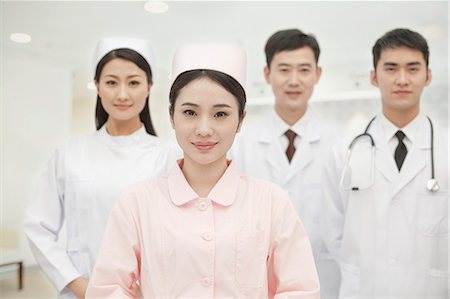 Portrait of Four Healthcare workers, China Stock Photo - Premium Royalty-Free, Code: 6116-07084925