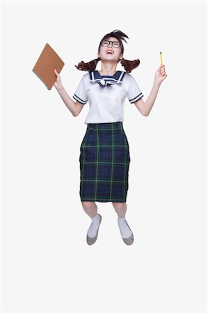 school girl uniforms - School Girl Jumping Foto de stock - Sin royalties Premium, Código: 6116-07085024