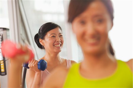 simsearch:853-03616708,k - Mature women lifting weights in the gym Stock Photo - Premium Royalty-Free, Code: 6116-07085474