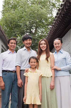 simsearch:6116-06939008,k - Three Generation Family in a Courtyard Stock Photo - Premium Royalty-Free, Code: 6116-07085550