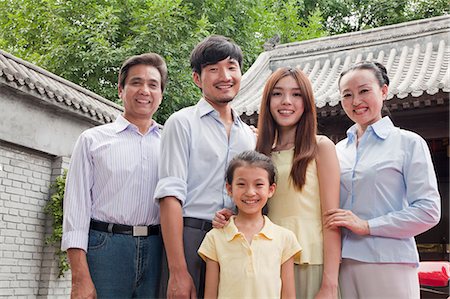 simsearch:6116-07235720,k - Three Generation Family in a Courtyard Stock Photo - Premium Royalty-Free, Code: 6116-07085551