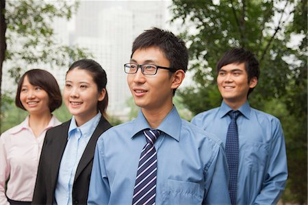simsearch:6116-07084811,k - Young business people in the park, portrait Stock Photo - Premium Royalty-Free, Code: 6116-07085591