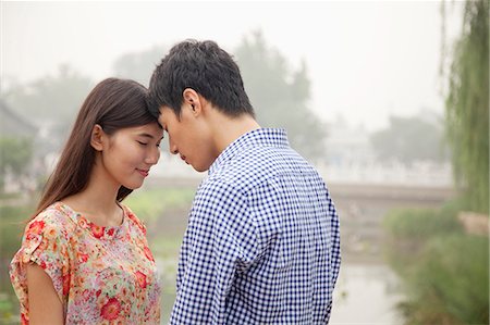 simsearch:614-06896801,k - Affectionate Couple By a Canal Stock Photo - Premium Royalty-Free, Code: 6116-07085779