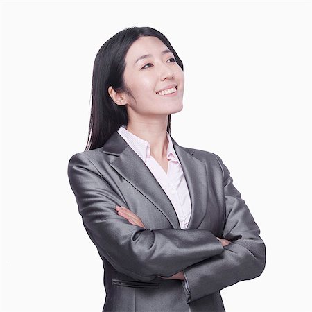 focused professional - Businesswoman looking away Stock Photo - Premium Royalty-Free, Code: 6116-07086371