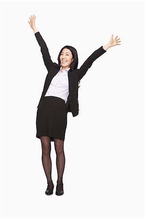 power business woman - Businesswoman cheering Stock Photo - Premium Royalty-Free, Code: 6116-07086331