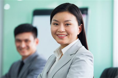 simsearch:6116-07084811,k - Portrait of Businesswoman with her Colleague Stock Photo - Premium Royalty-Free, Code: 6116-07086551