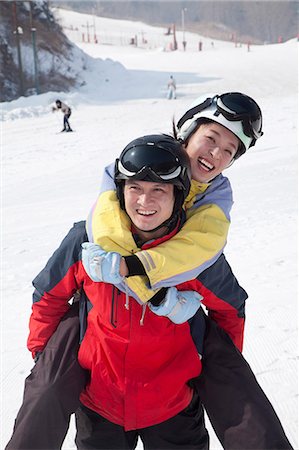 Smiling Couple in Ski Resort Stock Photo - Premium Royalty-Free, Code: 6116-07086614