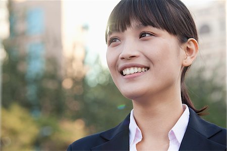 simsearch:6116-07084811,k - Young Businesswoman  Looking away Stock Photo - Premium Royalty-Free, Code: 6116-07235388