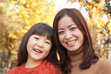 fall mother leaves - Mother and Daughter autumn Portrait Stock Photo - Premium Royalty-Free, Code: 6116-07235451