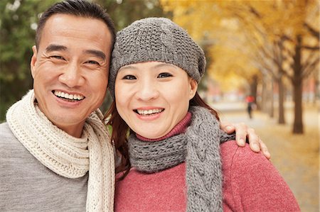 Smiling Mature Couple in Park Stock Photo - Premium Royalty-Free, Code: 6116-07235476