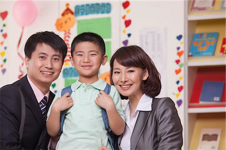 Parents with their Son in Classroom Stock Photo - Premium Royalty-Free, Code: 6116-07235582