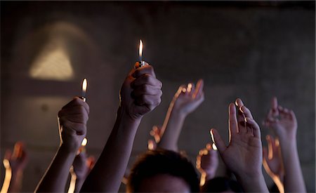 simsearch:6116-07236256,k - Group of people holding cigarette lighters at a concert Stock Photo - Premium Royalty-Free, Code: 6116-07235671