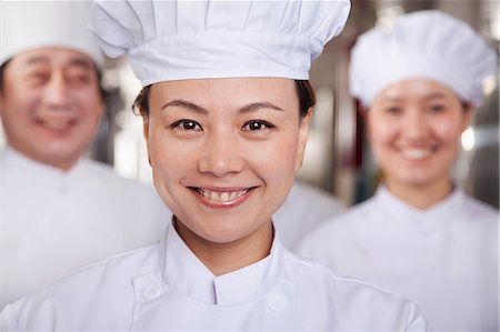 Portrait of a Chef in an Industrial Kitchen Stock Photo - Premium Royalty-Free, Code: 6116-07235619