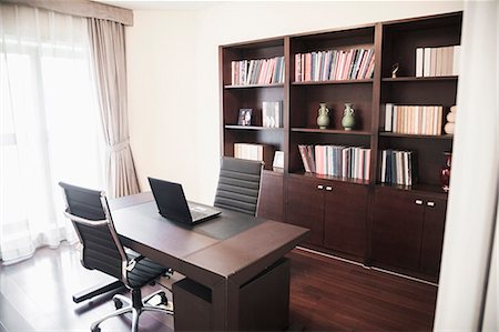 stage chairs - Modern home office with bookshelves. Stock Photo - Premium Royalty-Free, Code: 6116-07235704