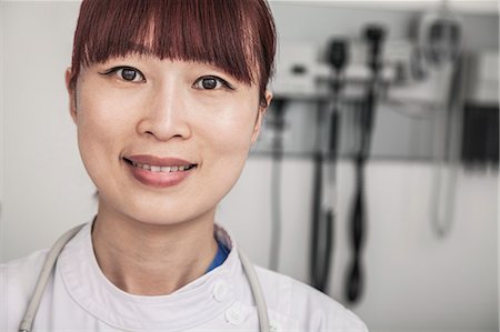 Portrait of smiling female doctor Stock Photo - Premium Royalty-Free, Code: 6116-07236078