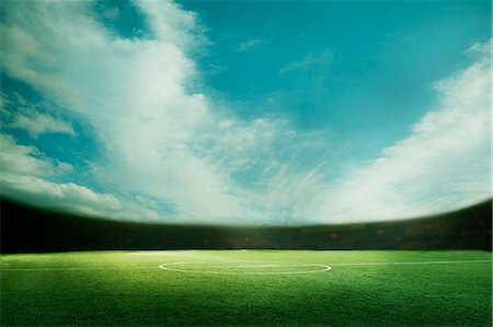 stadiums - Digital coposit of soccer field and blue sky Stock Photo - Premium Royalty-Free, Code: 6116-07236144