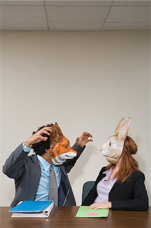 Colleagues wearing masks Stock Photo - Premium Royalty-Free, Code: 6116-08945640