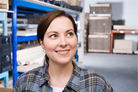simsearch:693-06379747,k - Woman in warehouse Stock Photo - Premium Royalty-Free, Code: 6116-08915248
