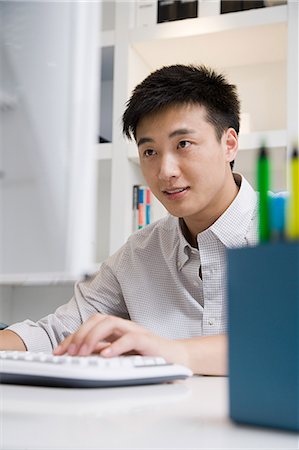 Male office worker Photographie de stock - Premium Libres de Droits, Code: 6116-09013530