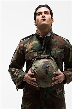 simsearch:841-07202015,k - Young male soldier holding helmet Stock Photo - Premium Royalty-Free, Code: 6116-09013740