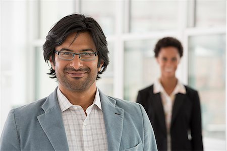 Business People. A Man And A Woman. Stock Photo - Premium Royalty-Free, Code: 6118-07122379