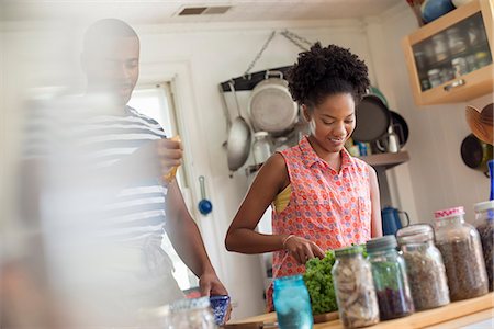 simsearch:6118-07203820,k - Lifestyle. Two people working in a farmhouse kitchen. Stock Photo - Premium Royalty-Free, Code: 6118-07203803