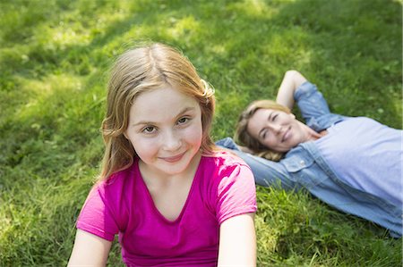 A family summer gathering at a farm. A shared meal, a homecoming. Stock Photo - Premium Royalty-Free, Code: 6118-07235057