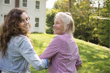 simsearch:6118-07122184,k - A family summer gathering at a farm. A shared meal, a homecoming. Stock Photo - Premium Royalty-Free, Code: 6118-07235063