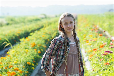 simsearch:6118-07351124,k - Summer on an organic farm. A young girl in a field of flowers. Stock Photo - Premium Royalty-Free, Code: 6118-07351124