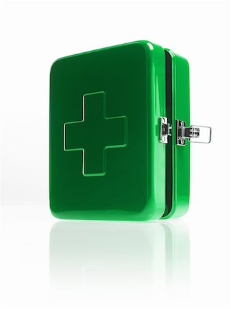 simsearch:6118-07352322,k - Green metal first aid box with fastener and large cross on the top. Stock Photo - Premium Royalty-Free, Code: 6118-07351715