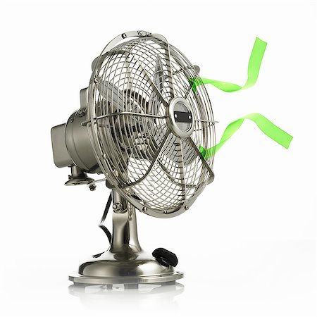 fan - An electric fan with protective cage around the moving parts, and green streamers waving in the breeze. Stock Photo - Premium Royalty-Free, Code: 6118-07351716