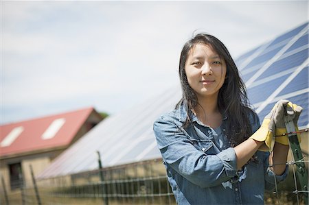 solar panel usa - A young woman on a traditional farm in the countryside of New York State, USA Stock Photo - Premium Royalty-Free, Code: 6118-07352268
