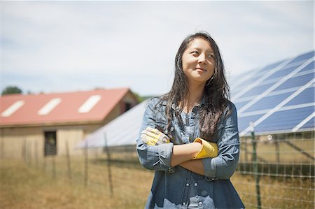 solar panel usa - A young woman on a traditional farm in the countryside of New York State, USA Stock Photo - Premium Royalty-Free, Code: 6118-07352271