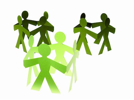simsearch:6118-07352322,k - Papercuts, paper cut out figures representing people with joined hands. Stock Photo - Premium Royalty-Free, Code: 6118-07352312