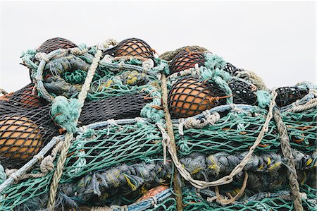 simsearch:6118-08910527,k - Commercial fishing nets at Fisherman's Terminal, Seattle, USA. Photographie de stock - Premium Libres de Droits, Code: 6118-07352687
