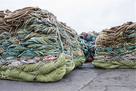 simsearch:6118-08910527,k - Commercial fishing nets at Fisherman's Terminal, Seattle, USA. Foto de stock - Sin royalties Premium, Código: 6118-07352685