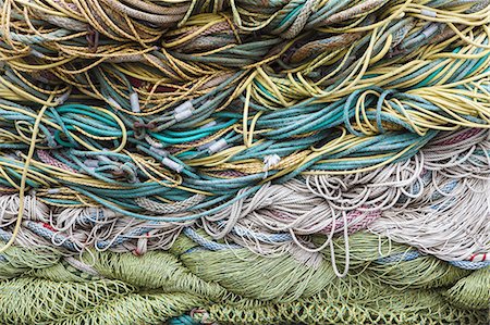 simsearch:6118-08910527,k - Commercial fishing nets at Fisherman's Terminal, Seattle, USA. Photographie de stock - Premium Libres de Droits, Code: 6118-07352686