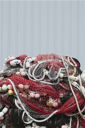 simsearch:6118-08910527,k - Commercial fishing nets at Fisherman's Terminal, Seattle, USA. Photographie de stock - Premium Libres de Droits, Code: 6118-07352689