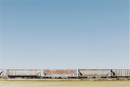 Wagons of a train crossing the Black Rock Desert. Stock Photo - Premium Royalty-Free, Code: 6118-07352757